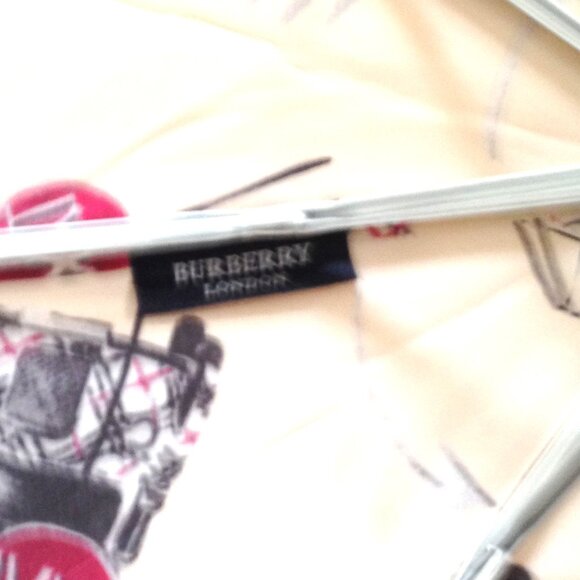 Burberry, and Moschino Umbrellas - Picture 10 of 16